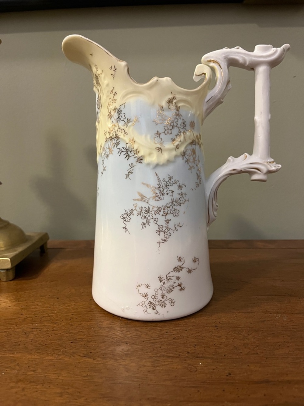 Porcelain antique Floral Bird Pitcher in White and Pale Yellow